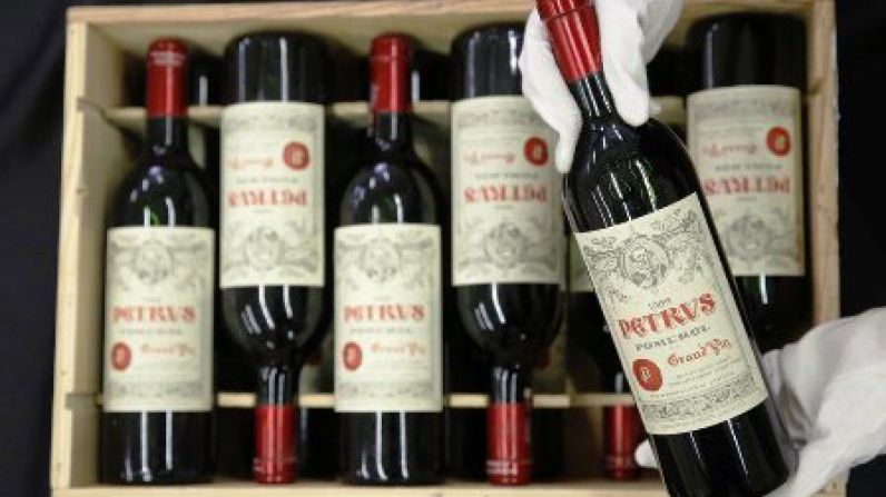 Ronaldo shocked as team mate drinks his £8,000 bottle of Petrus.